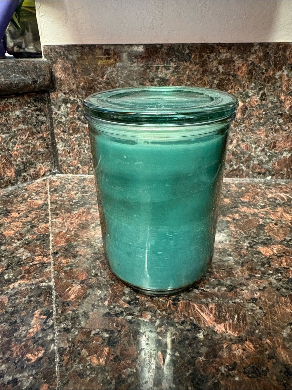 Handmade upcycled candle made by me with pine scented wax in a repurposed jar